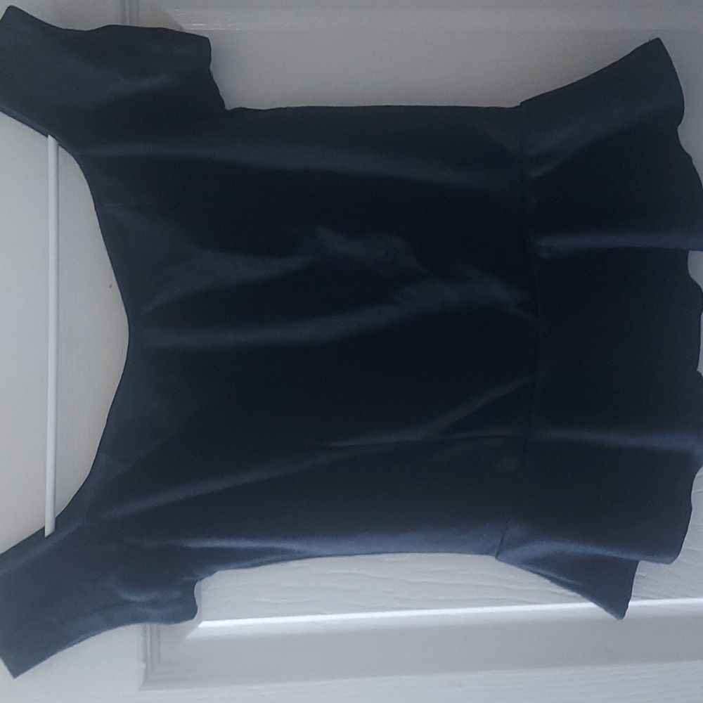 Black short sleeved peplum top